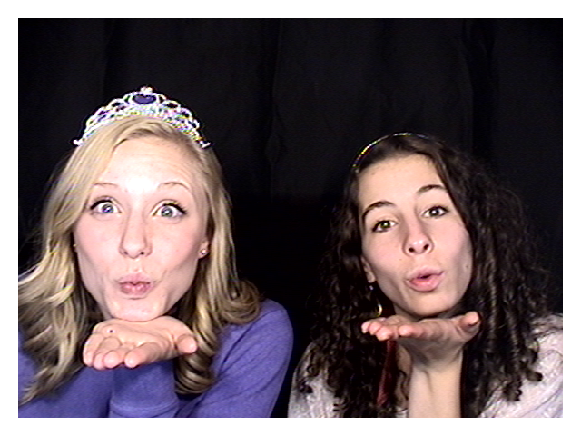 Friends posing in classic photobooth