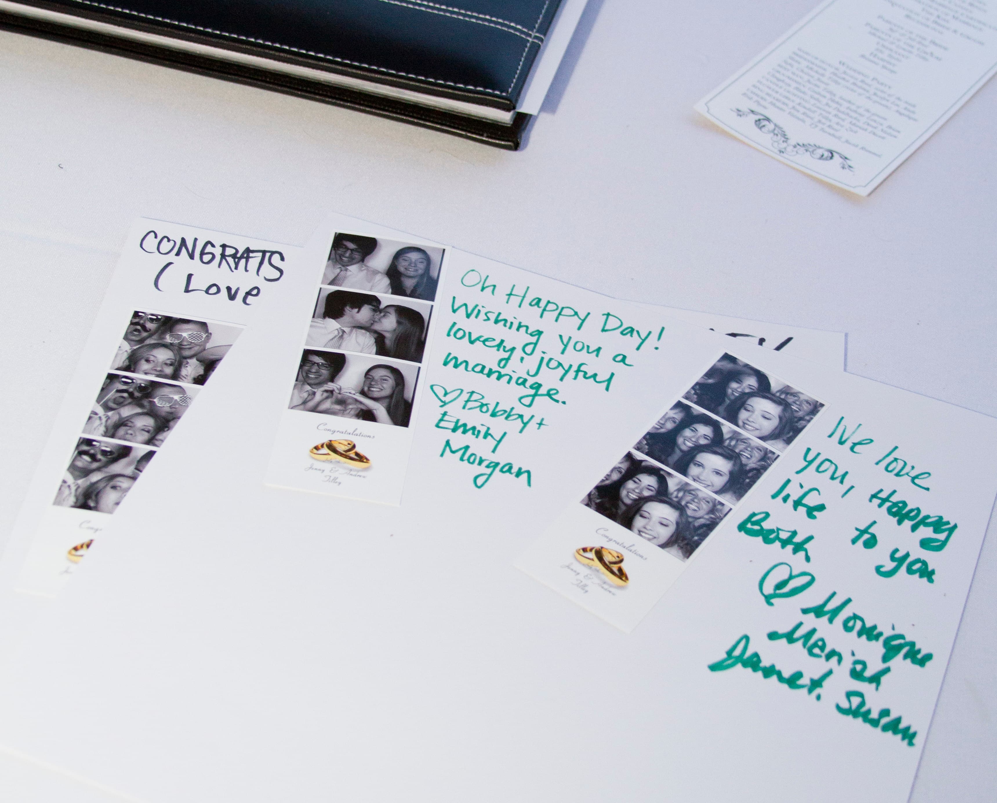 A customized guest book with photo strips and messages from guests